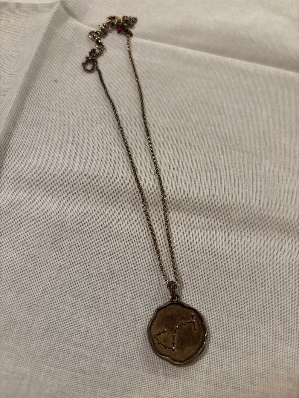 Lucky Brand Gold Tone Coin Pendant Necklace with Constellation Detail